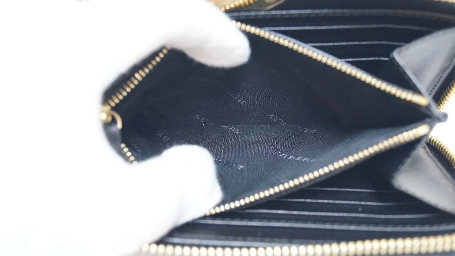 BURBERRY Embossed Check Leather Zip Around Wallet Black