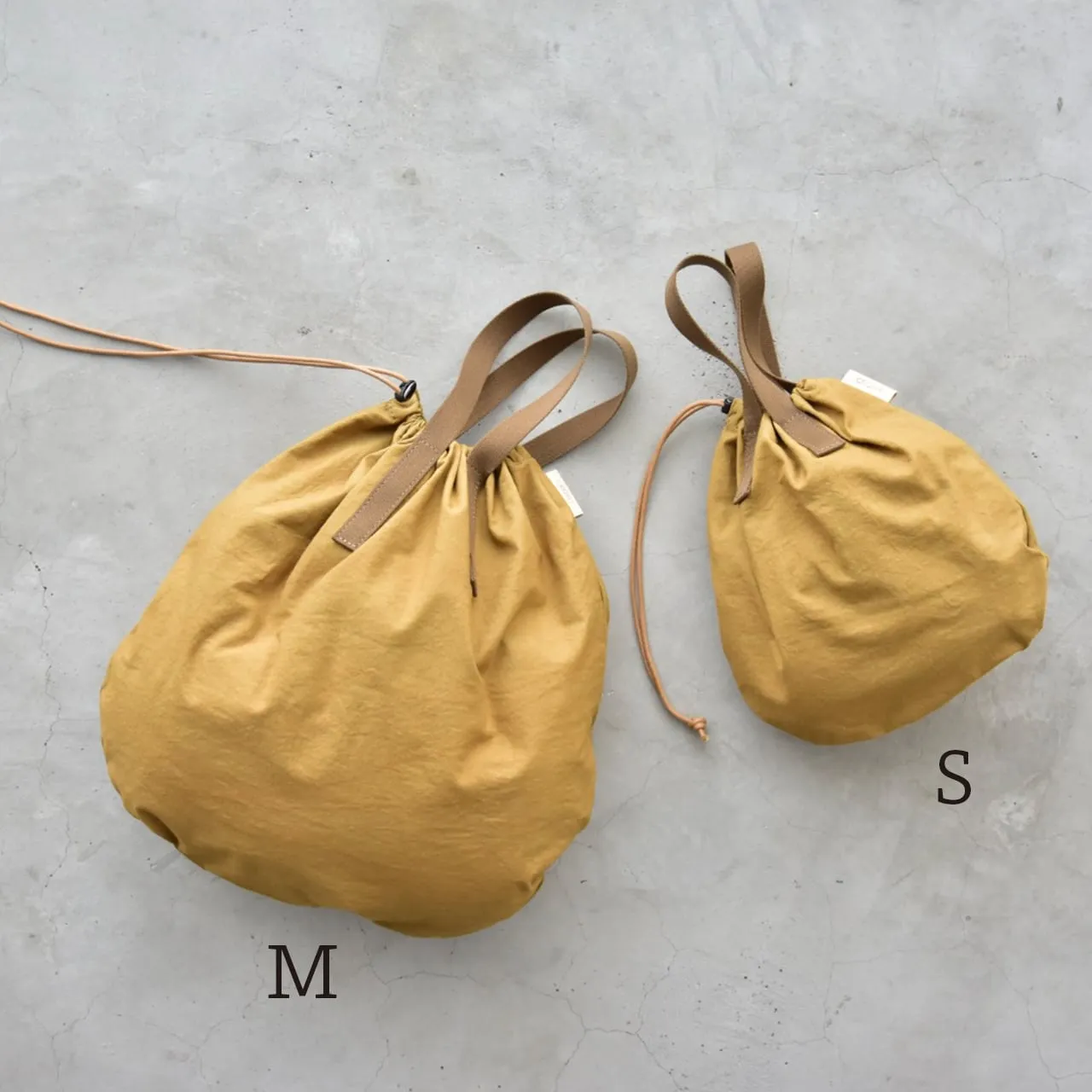 CRONY. | クルニー　Kinchaku Tote M