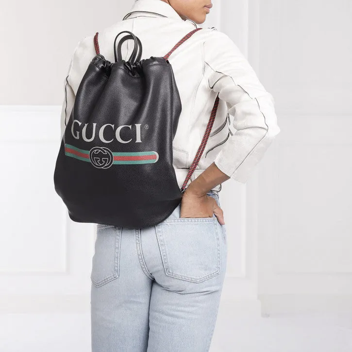 Gucci Logo-Print Drawstring Backpack in Black