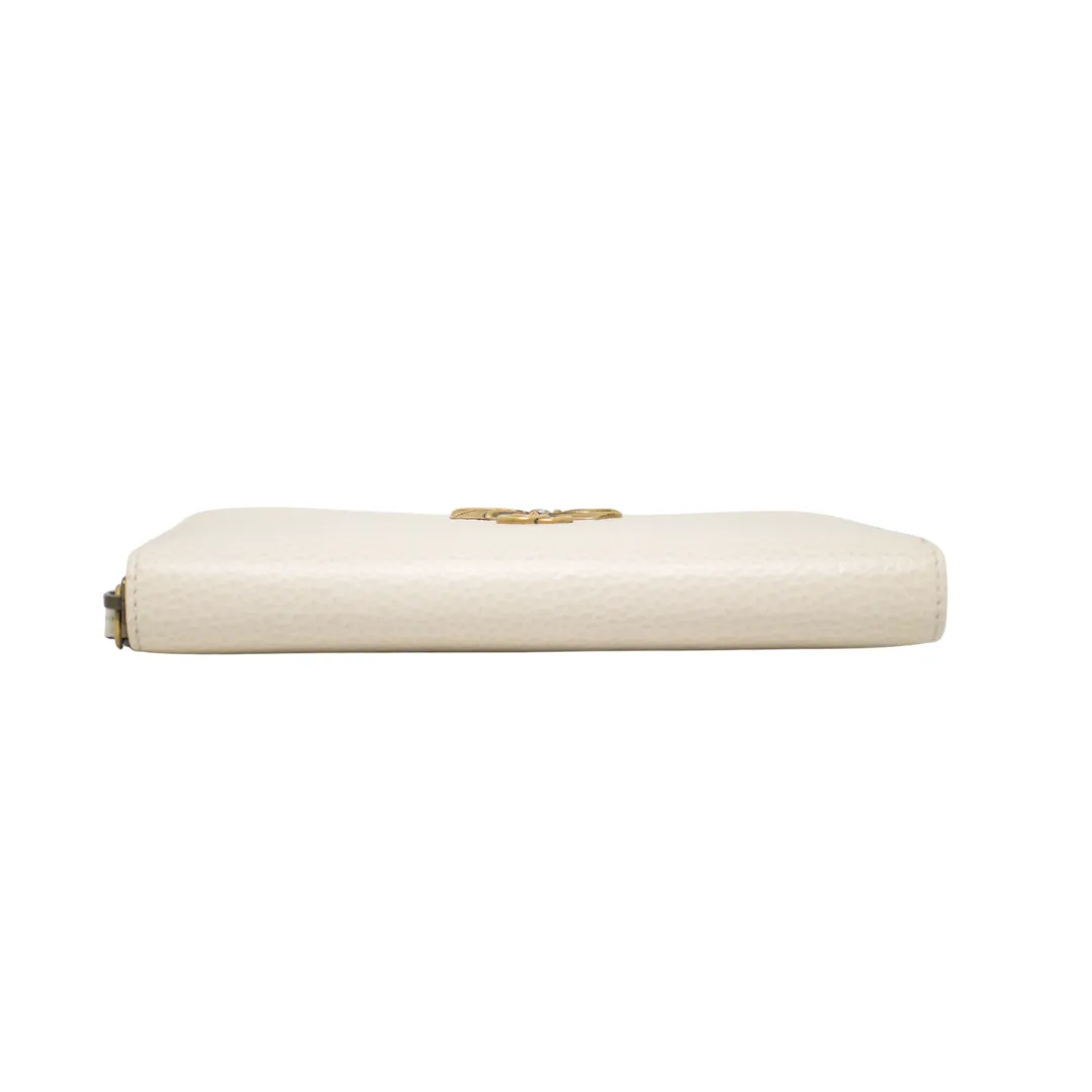 GUCCI ZIP AROUND WALLET WITH BOW