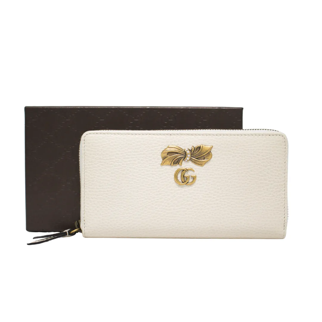 GUCCI ZIP AROUND WALLET WITH BOW