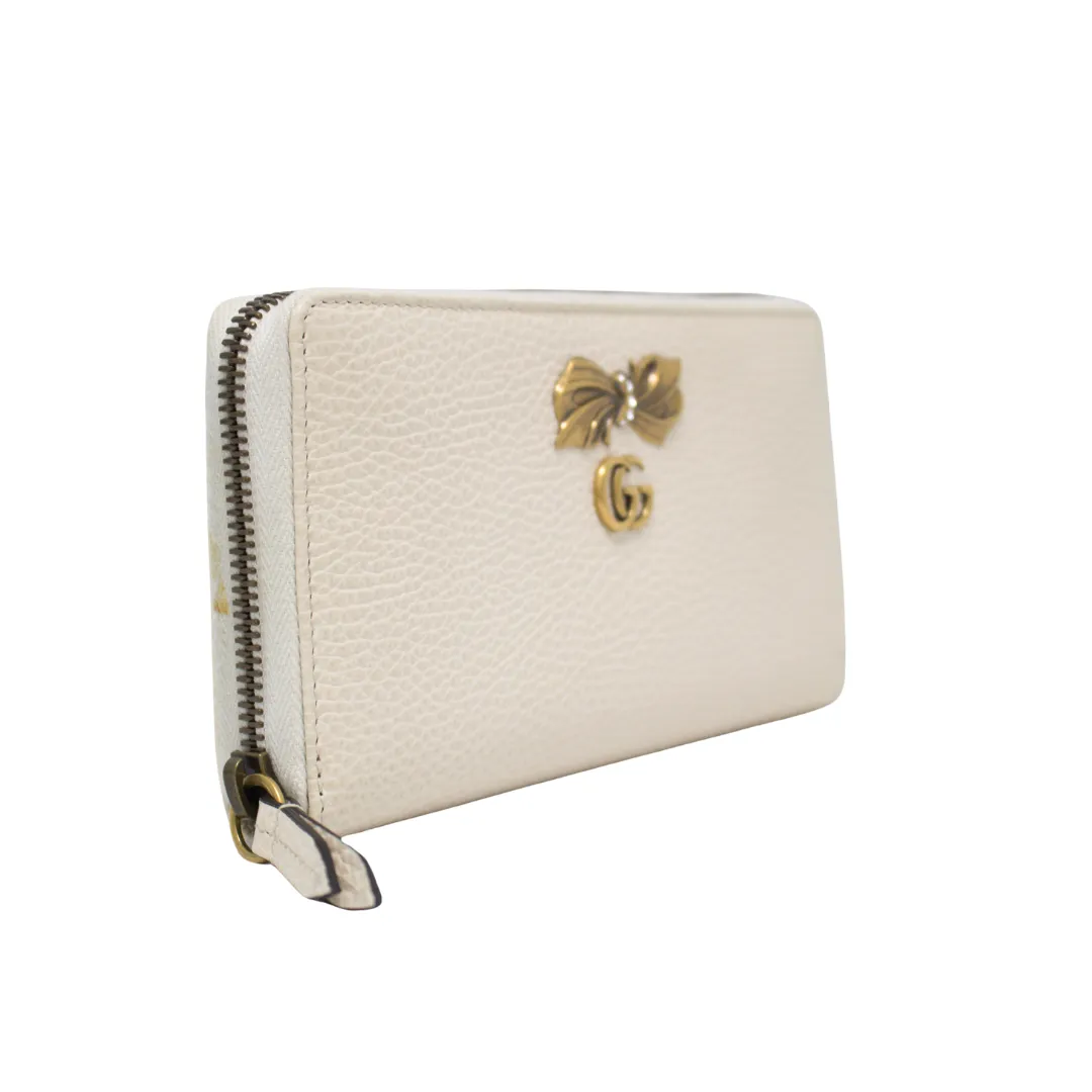 GUCCI ZIP AROUND WALLET WITH BOW