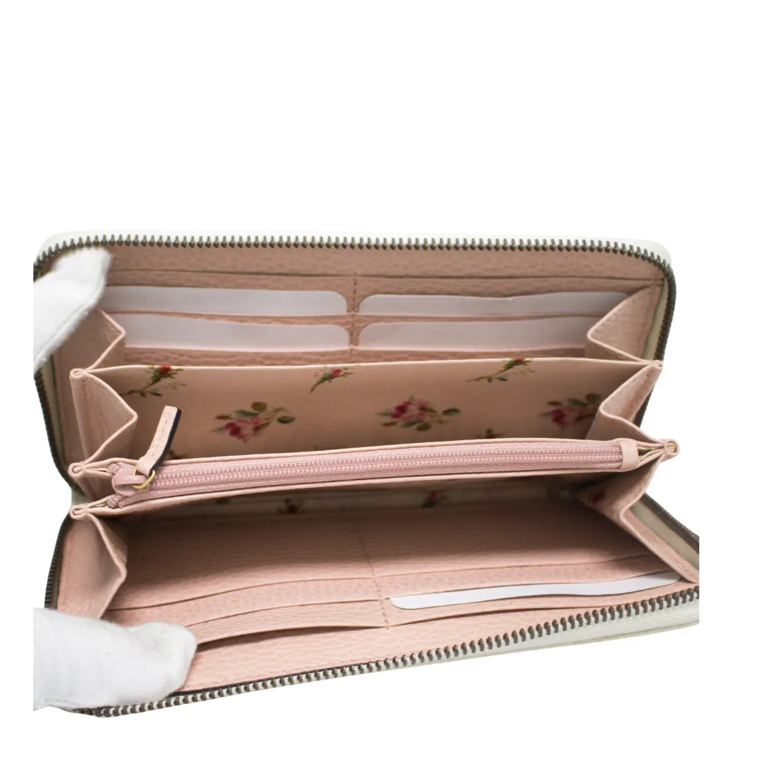 GUCCI ZIP AROUND WALLET WITH BOW