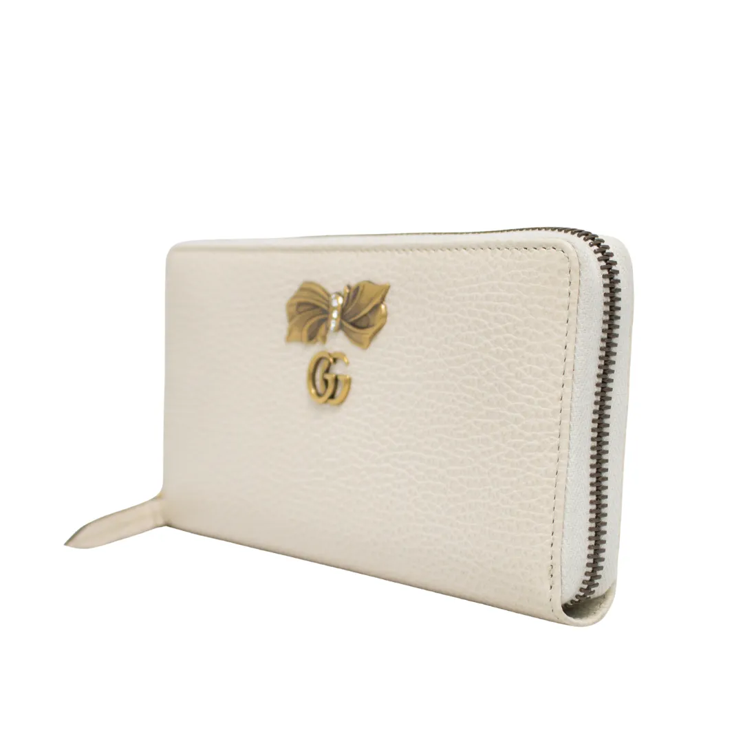 GUCCI ZIP AROUND WALLET WITH BOW