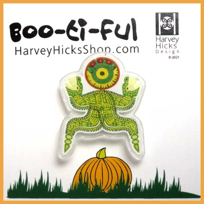 Halloween pin featuring a leaf nose bat, orange