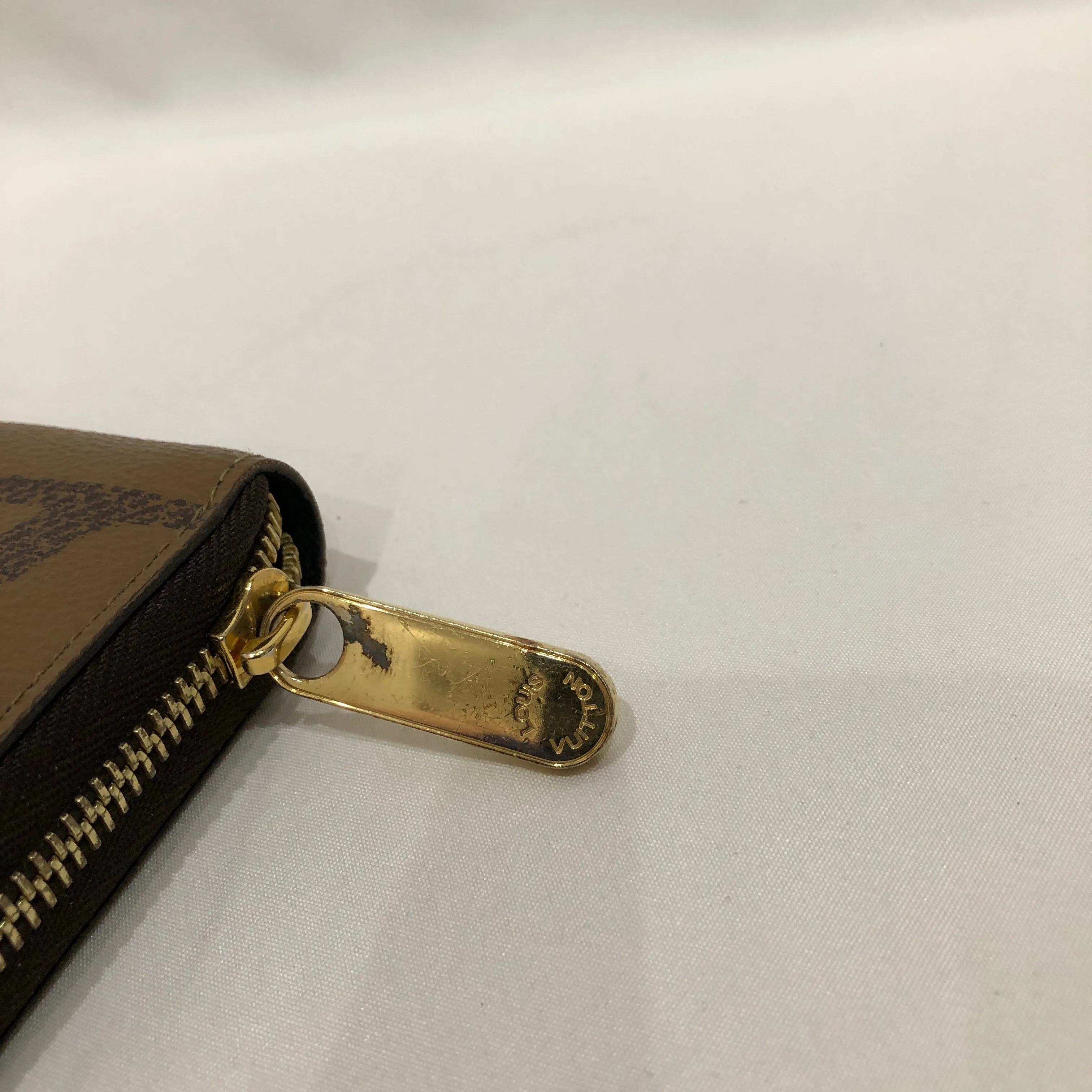 Louis Vuitton Brown Leather Monogram Reversed Zip Around Long Wallet Sku# 82303