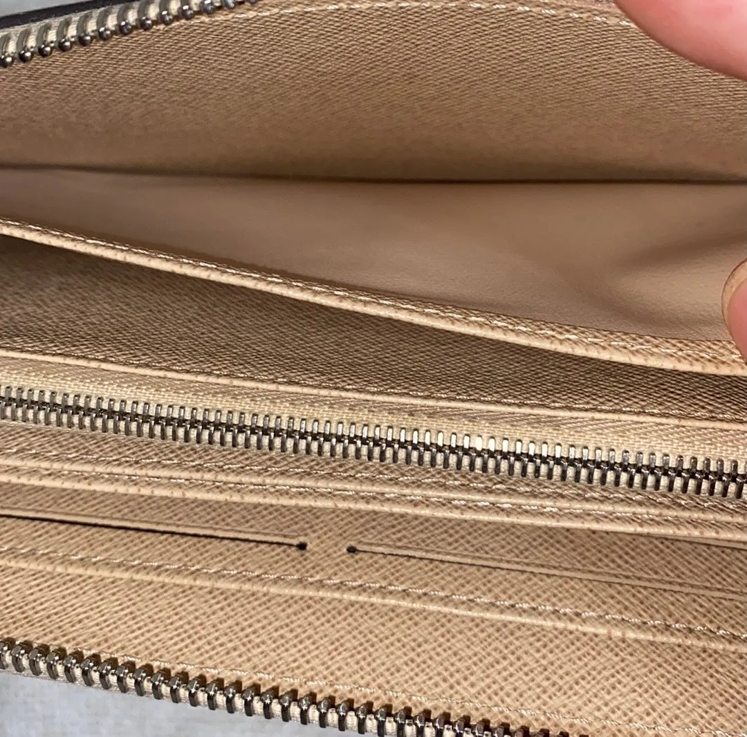 Louis Vuitton Epi Leather Long Zippy Zip Wallet In Beige