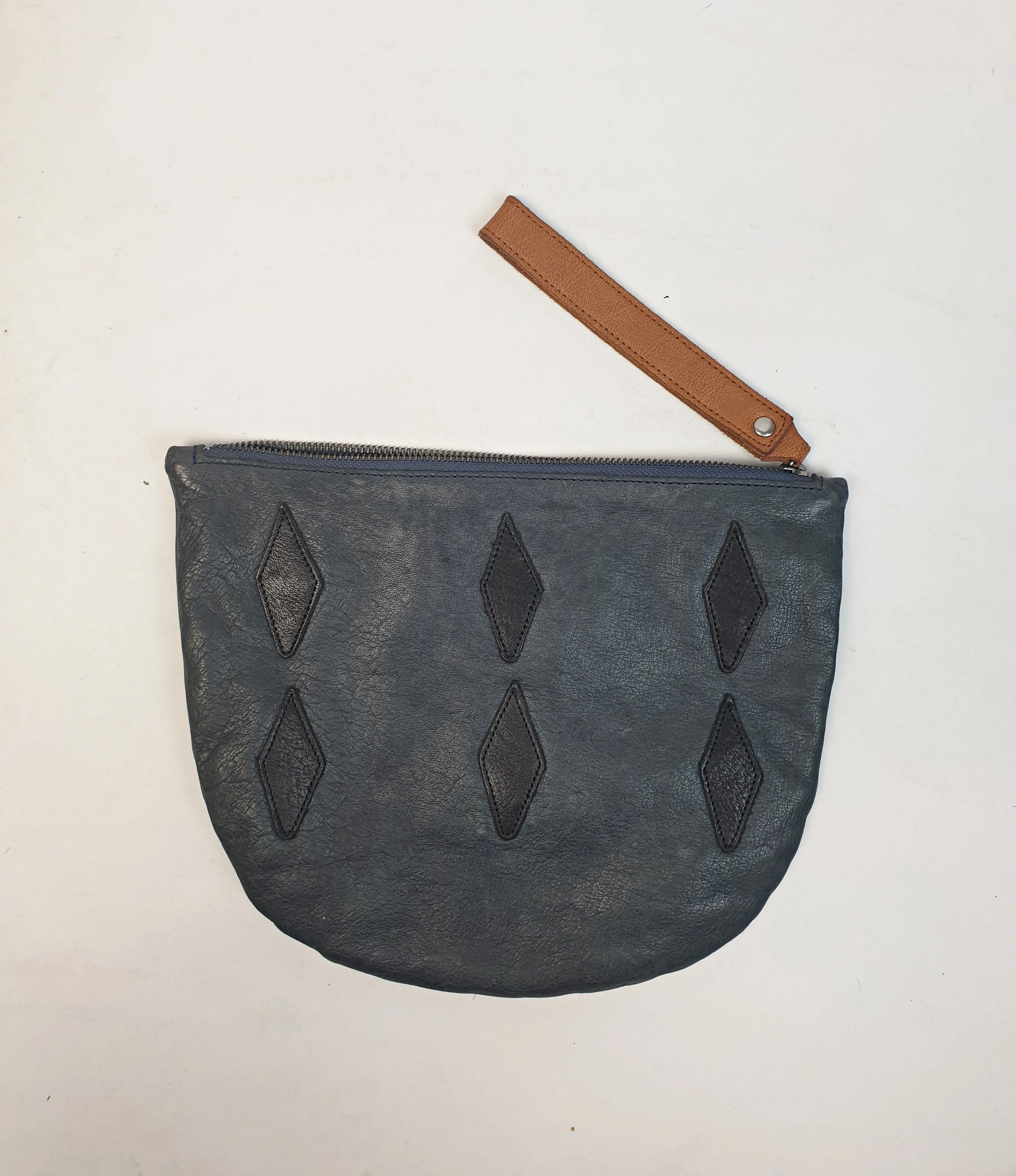 Nancybird soft leather navy clutch with brown wrist strap