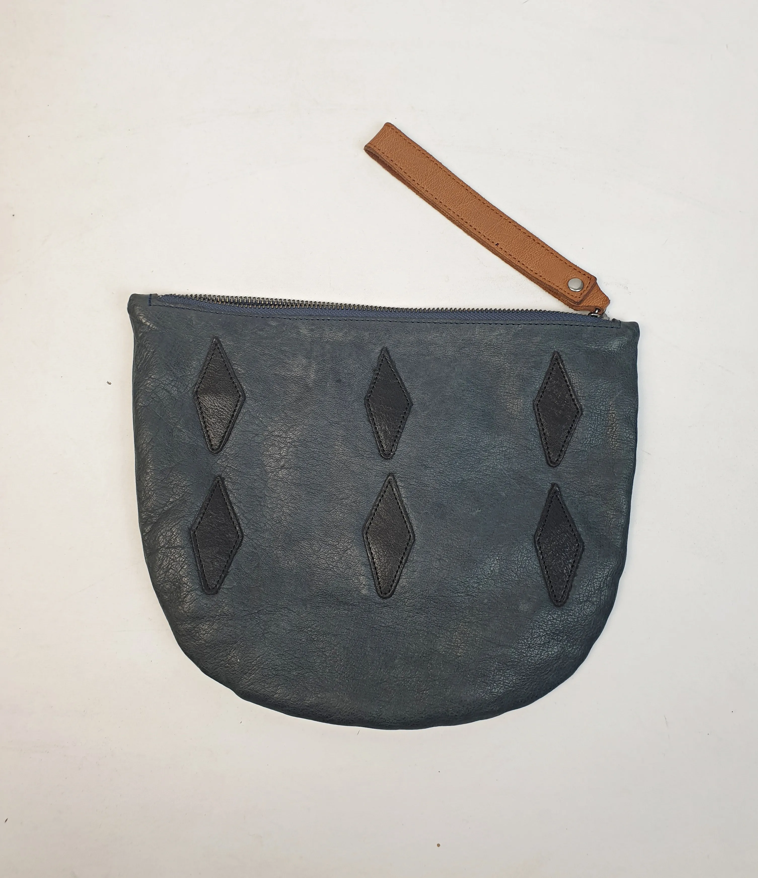 Nancybird soft leather navy clutch with brown wrist strap