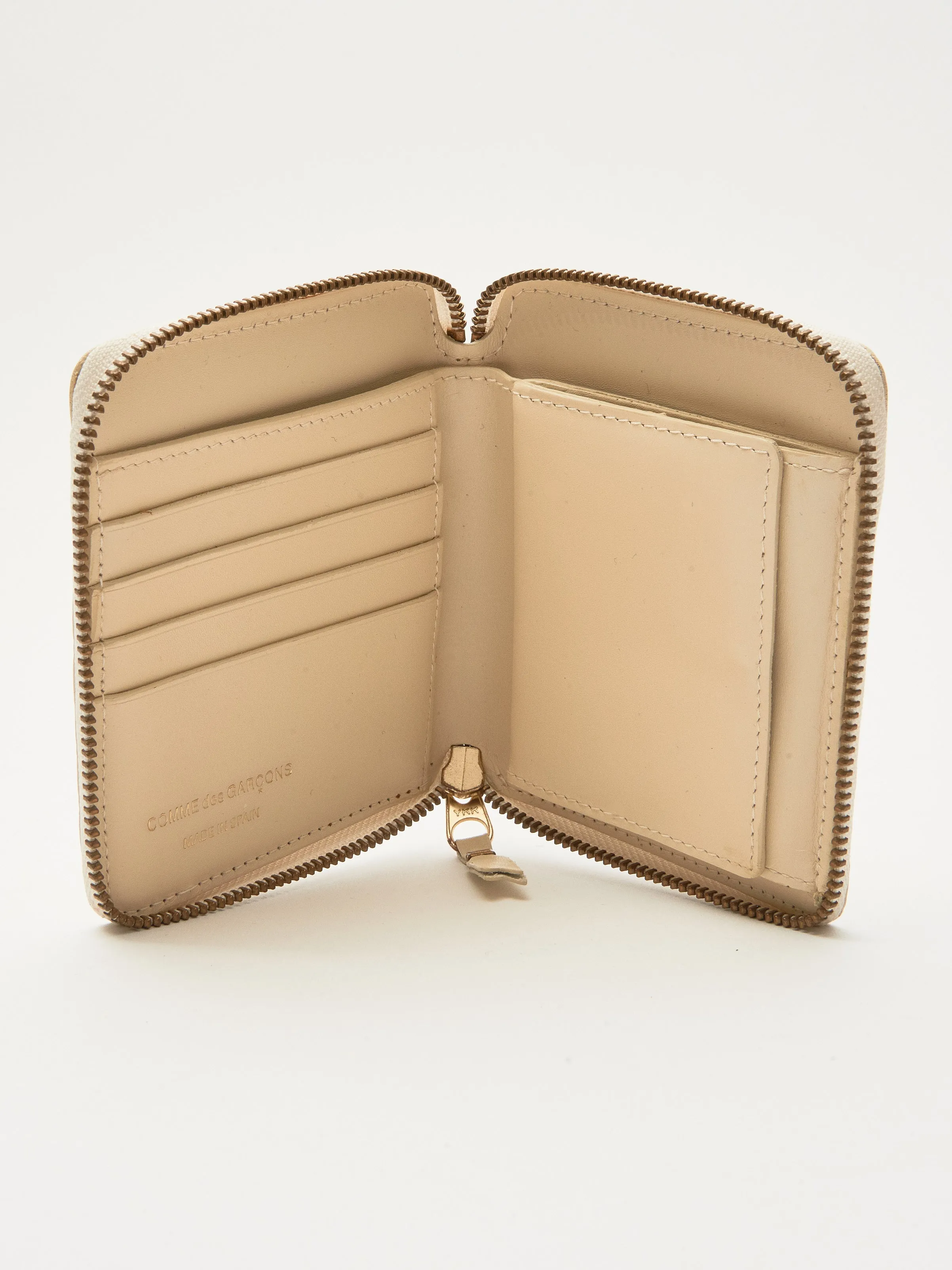 Off White Embossed Zip Around Wallet