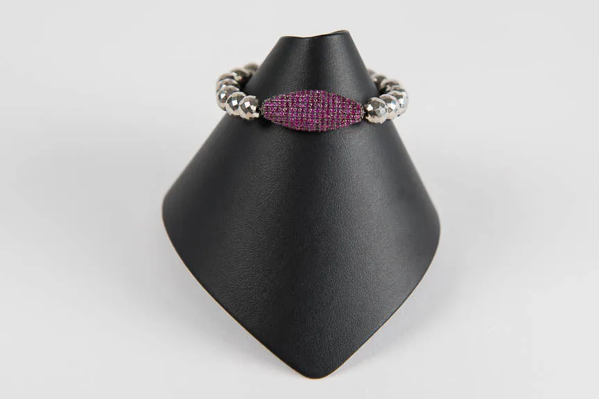 Pyrite with ruby bead