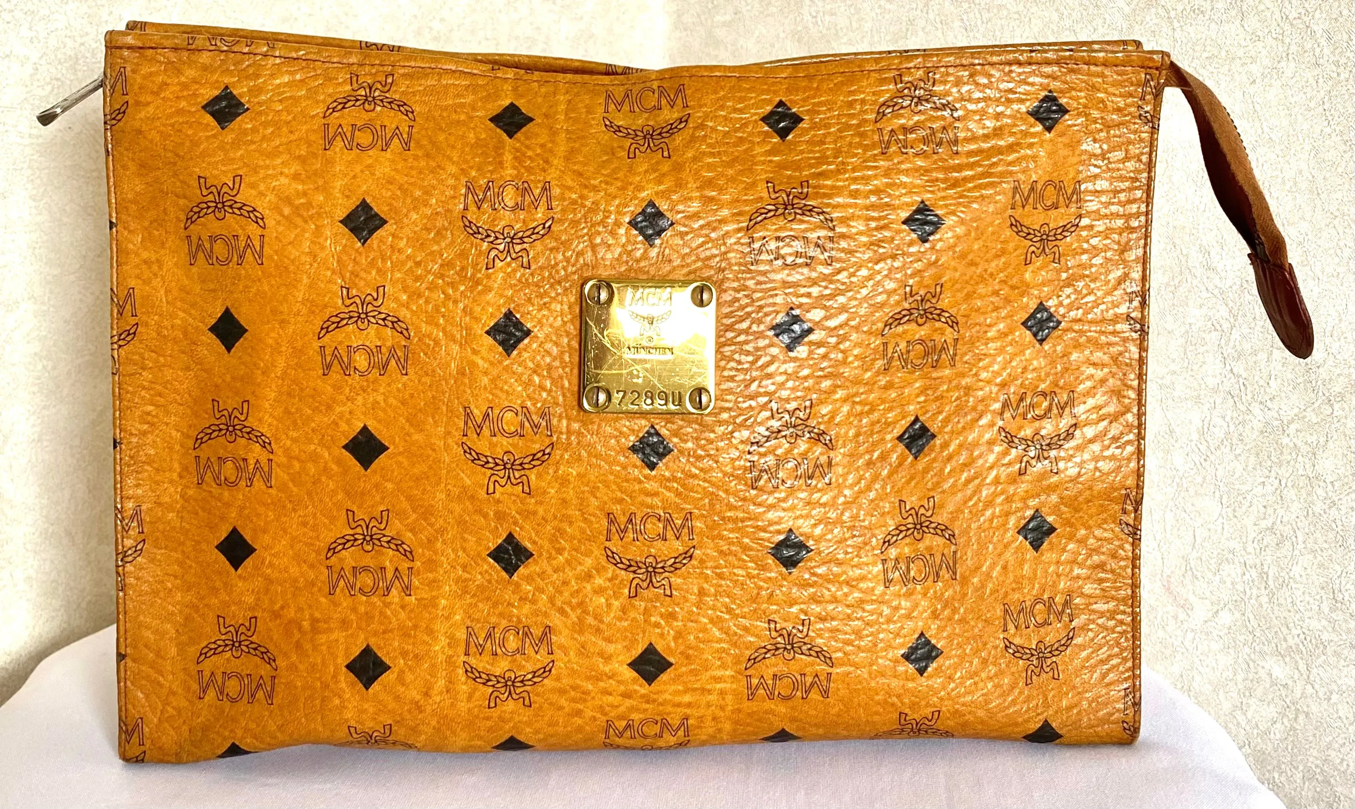 Vintage MCM classic brown monogram clutch bag, makeup pouch, toiletry bag. Clutch purse for unisex use, designed by Michael Cromer. 050605ya