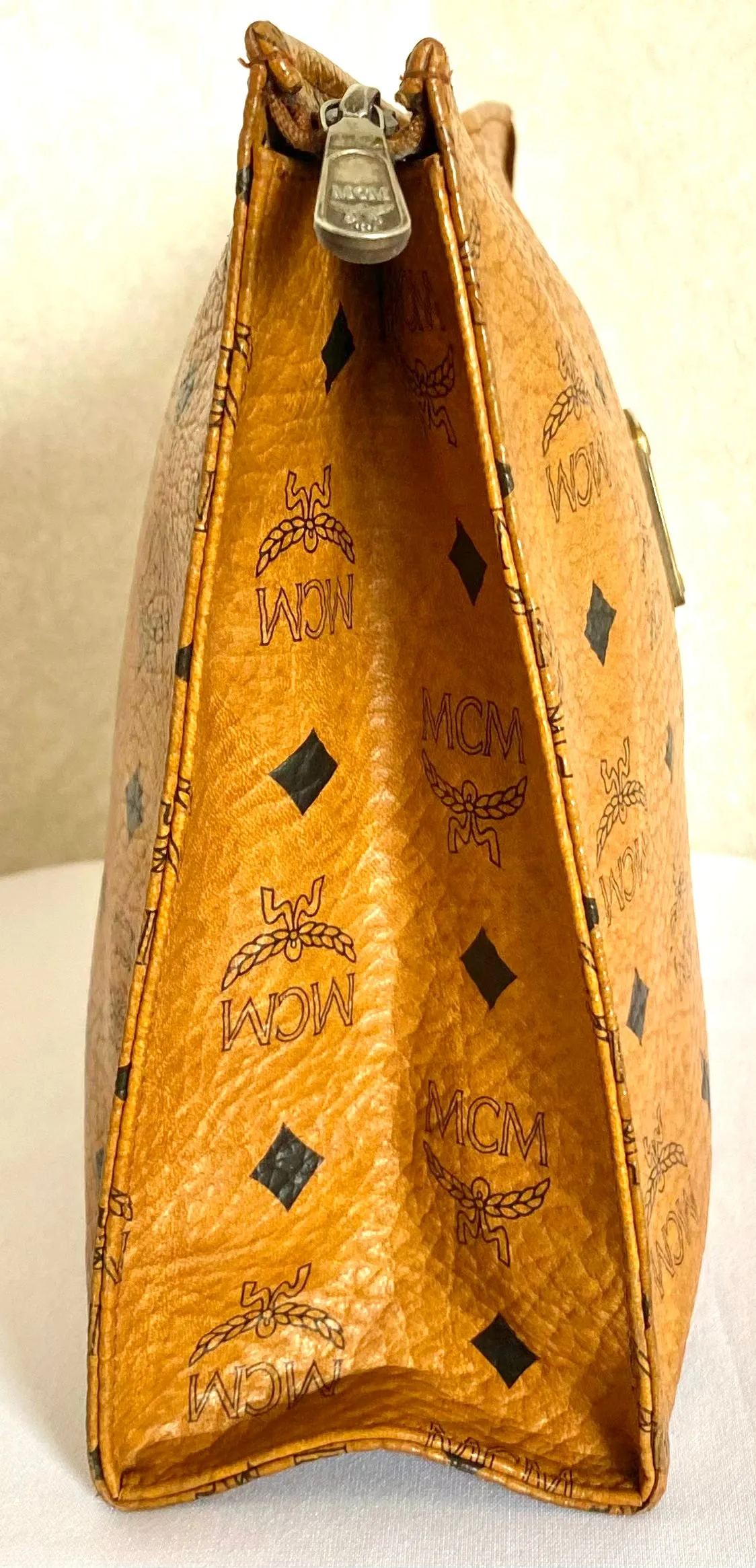 Vintage MCM classic brown monogram clutch bag, makeup pouch, toiletry bag. Clutch purse for unisex use, designed by Michael Cromer. 050605ya