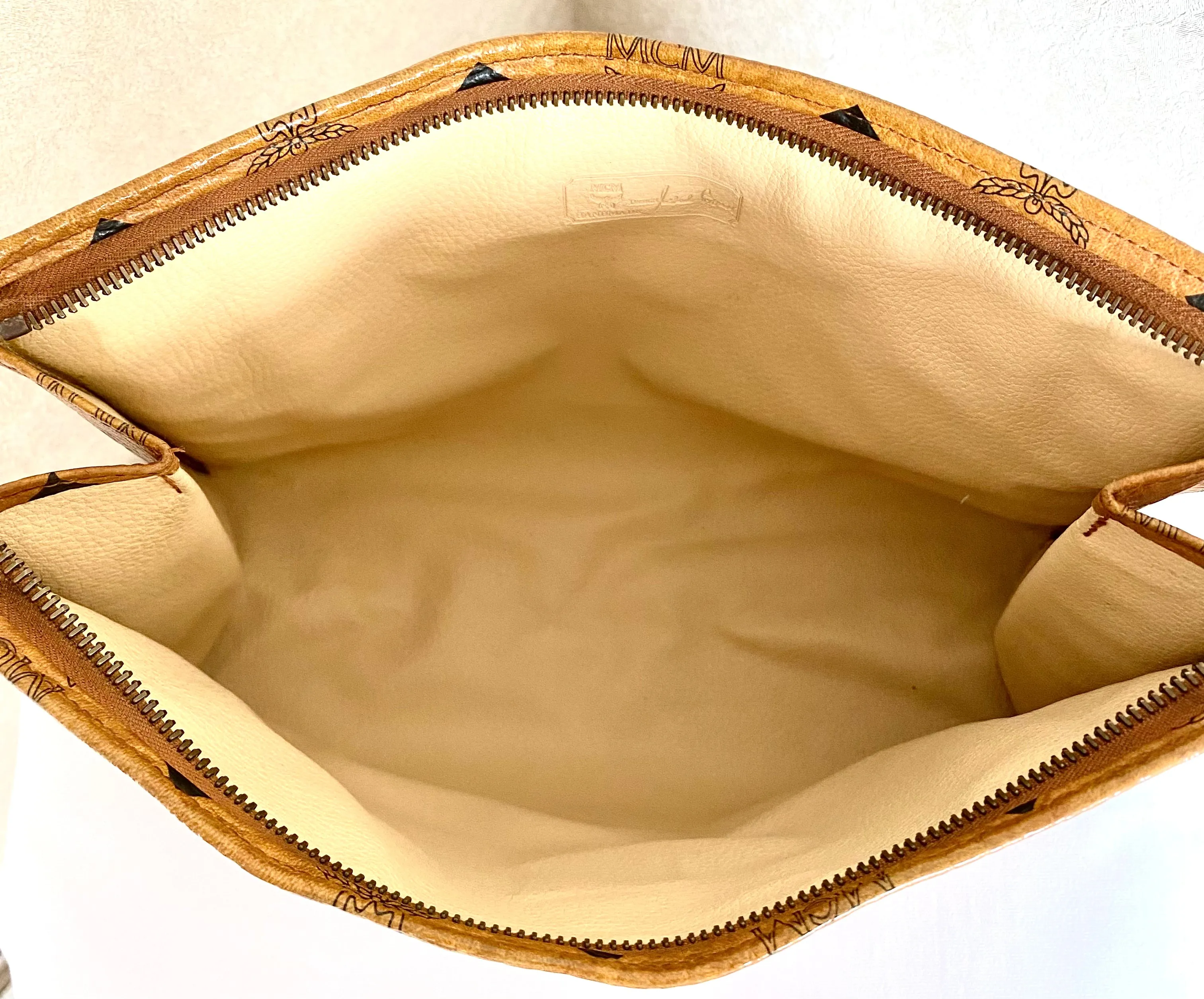 Vintage MCM classic brown monogram clutch bag, makeup pouch, toiletry bag. Clutch purse for unisex use, designed by Michael Cromer. 050605ya